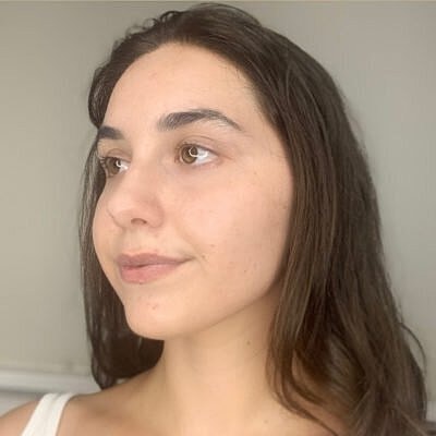 Profile of a young woman with long hair.