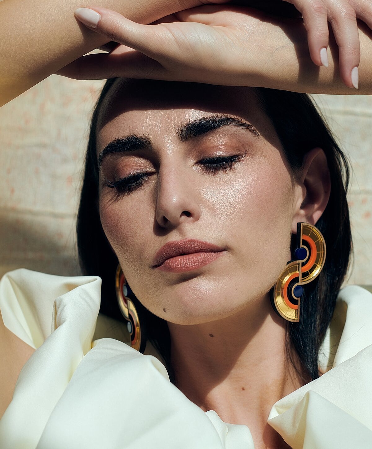 Smiling woman relaxing in a hammock.