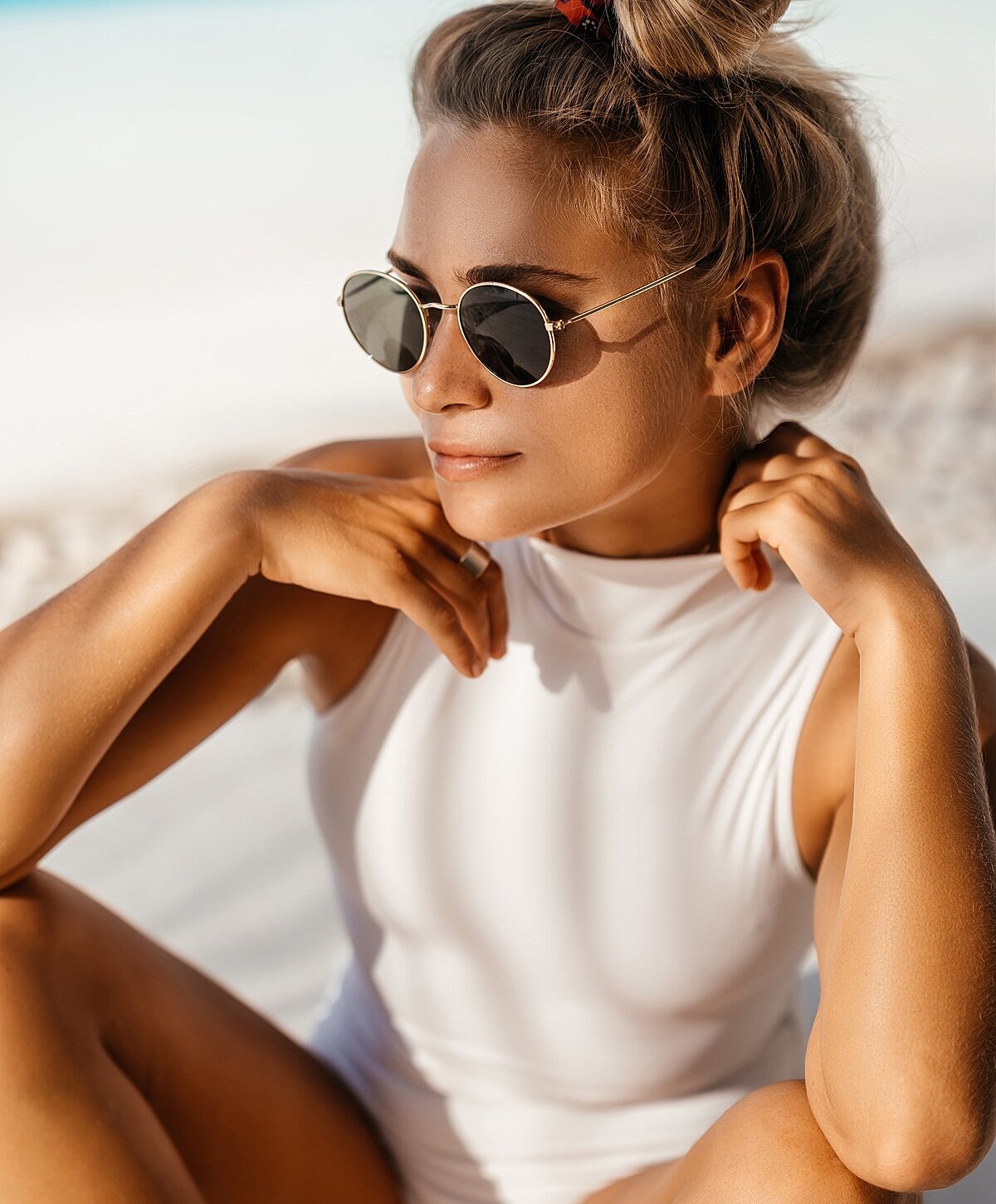 Portrait of a woman with long wavy hair.