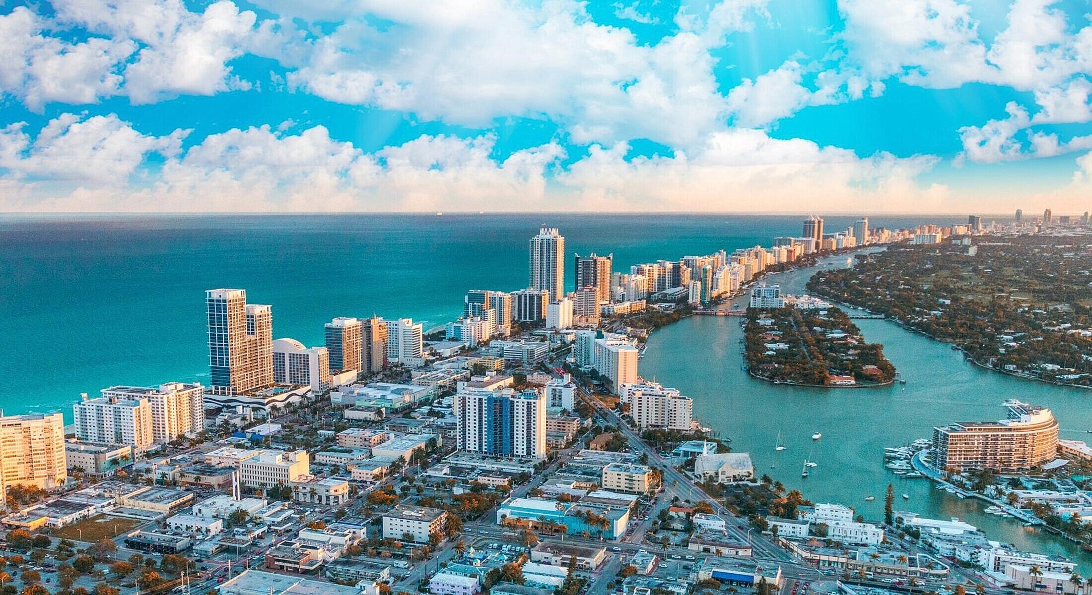 Aerial view of Miami coastline and skyline.